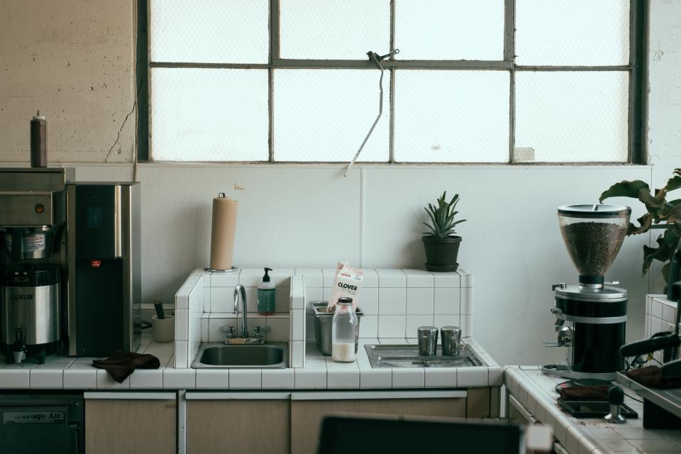 Bright kitchen with a clean sink and faucet