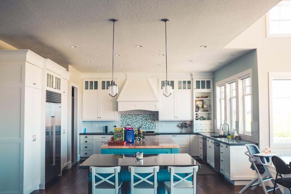 White kitchen with a large island